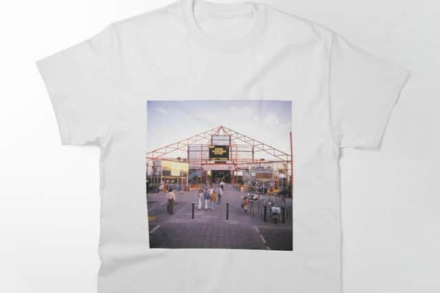 One of Living Archive's T-shirts features The Point at CMK