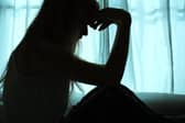 File image of the silhouette of a woman.