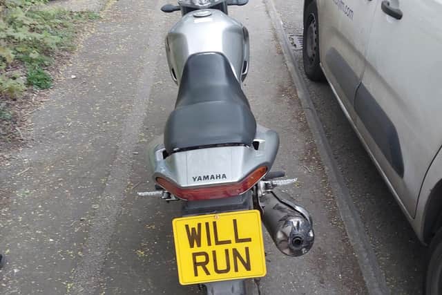 The crook put the false plate 'WILL RUN' on the stolen bike
