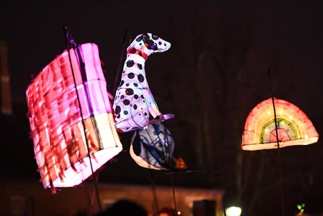 Giant lanterns lit up the sky as the procession wound its way to the Market Square for the Xmas lights switch-on