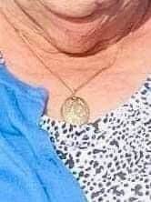 If you see this gold locket necklace, please call police