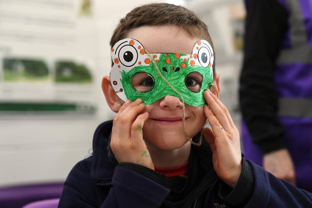 Youngsters designed their own frog-themed masks, (photo by Jane Russell)