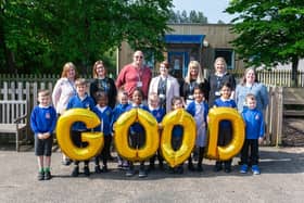 Holmwood School and Nursery Team with some children