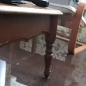 A huge puddle forms in the living room every time it rains