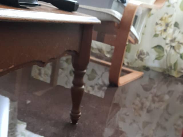 A huge puddle forms in the living room every time it rains