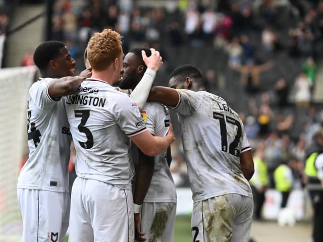 Mo Eisa bagged twice as Dons took a 4-1 lead at Stadium MK but it was not meant to be