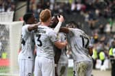 Mo Eisa bagged twice as Dons took a 4-1 lead at Stadium MK but it was not meant to be