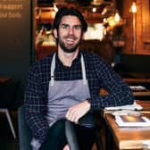 Brain tumour patient John Lawson in the Food by John Lawson restaurant he owns