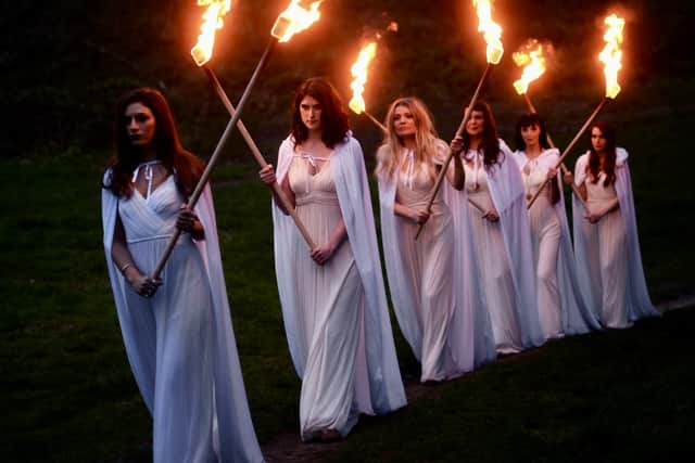 The evening begins with a torchlit procession