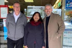 Jignasha Patel outside Heelands Post Office with Post Office Area Manager Keith Mabberley and former Area and Regional Manager Paul Meads.