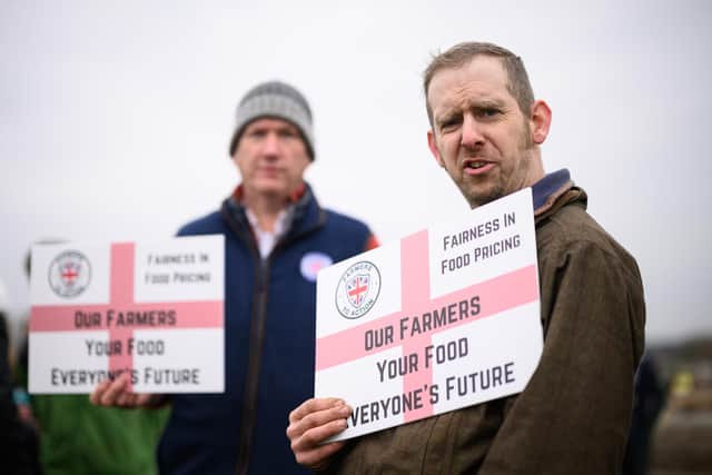 Protesters at Keir Starmer's Milton Keynes visit. (Photo by Leon Neal - WPA Pool/Getty Images)