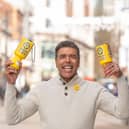 Chris Kamara helping with Leeds bucket collection.