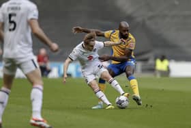 MK Dons face a play-off contest ahead after a 4-1 defeat at home to Mansfield Town.