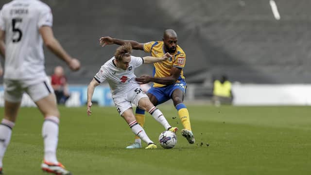 MK Dons face a play-off contest ahead after a 4-1 defeat at home to Mansfield Town.