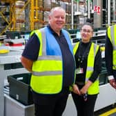 Callum with staff at the distribution centre