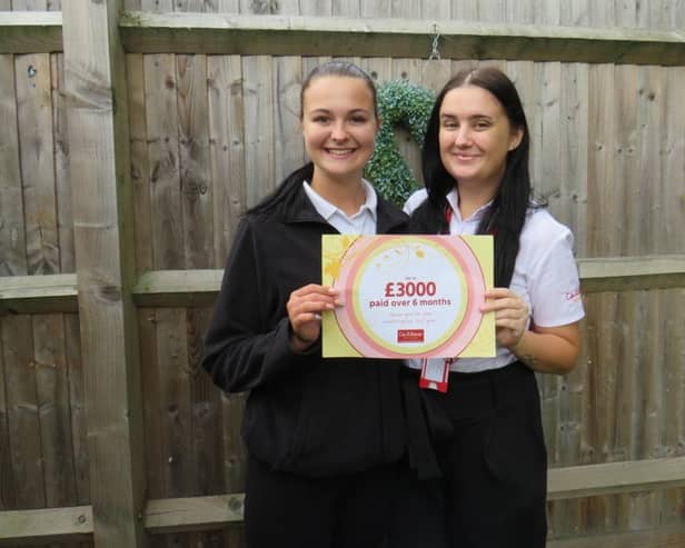 Meadow View staff Emily Spires and Alexandra McIntyre celebrate their bonus payment and salary increase