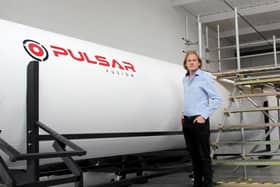 Pulsar Fusion boss Richard Dinan with the remarkable space rocket that's being made on a Milton Keynes industrial estate