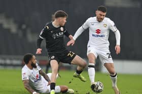 Struggling MK Dons have seen their promotion dreams go up in smoke with some stuttering form.