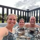 Alan Wooding and his companions enjoy the hot tub