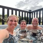 Alan Wooding and his companions enjoy the hot tub