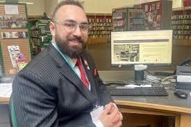 Councillor Joe Hearnshaw, Cabinet member for Children and Young People, accessing free family tracing services at Central Library