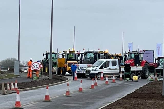 Farmers have blocked the road to prevent the prime minister from leaving Milton Keynes