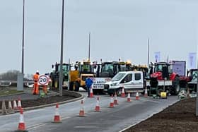 Farmers have blocked the road to prevent the prime minister from leaving Milton Keynes