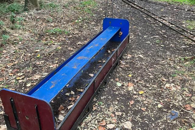 The carriages of Willen Lake's iconic miniature train are slowly rotting away today