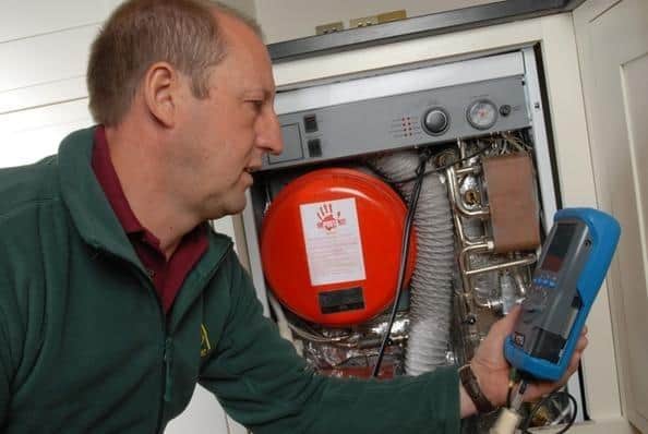 An OFTEC registered technician at work.