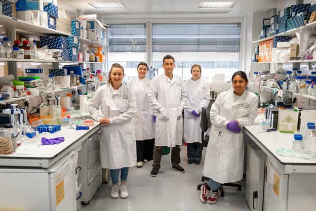Prof Chris Jones pictured with his team at The Institute of Cancer Research in London