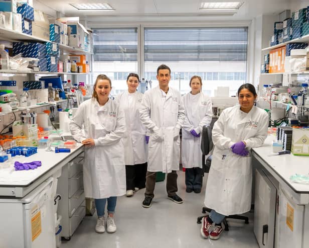 Prof Chris Jones pictured with his team at The Institute of Cancer Research in London