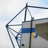 Mansfield's Field Mill stadium was deemed waterlogged ahead of the game with MK Dons today (Saturday)