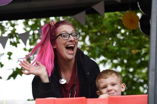In the pink and in carnival mood for this happy supporter who joined one of the parade floats