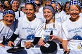 Winners of the Olney Pancake Race - pictured L to R Rebecca Budd & Lupe Morera (joint third) Eloise Kramer (winner) Linda Church (second)