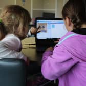 Jam Coding pupils enjoying a computing workshop