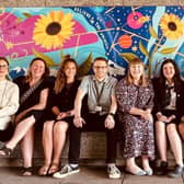 Cllrs Emily Darlington and  Zoe Nolan with members of MK Youth Cabinet, artist Kremena Dimitrova and local partners outside the Buszy mural in Central MK