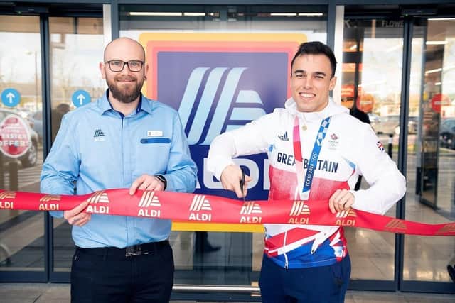 Team GB Olympic cyclist hero Ryan Owens picture with Aldi's new store manager Nick Taylor