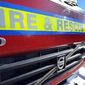 Thirteen people were evacuated after a fire at a residential unit in Bletchley broke out in the early hours of Thursday morning