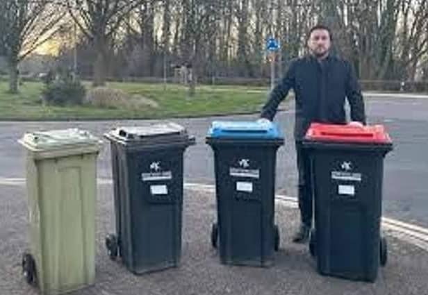 MK Council leader Pete Marland shows how many bins each household will have