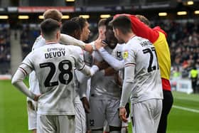 MK Dons will be out to make it three wins in a row on Saturday when they host Morecambe at Stadium MK