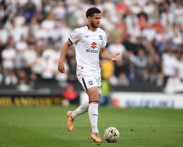 MK Dons are being tipped to come back stronger next season.
