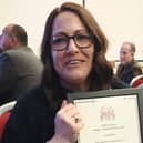 Karen Chapman proudly displays her certificate after winning the Care Givers award at the Milton Keynes Mayor’s Awards 2025