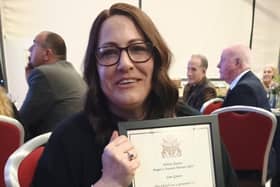 Karen Chapman proudly displays her certificate after winning the Care Givers award at the Milton Keynes Mayor’s Awards 2025