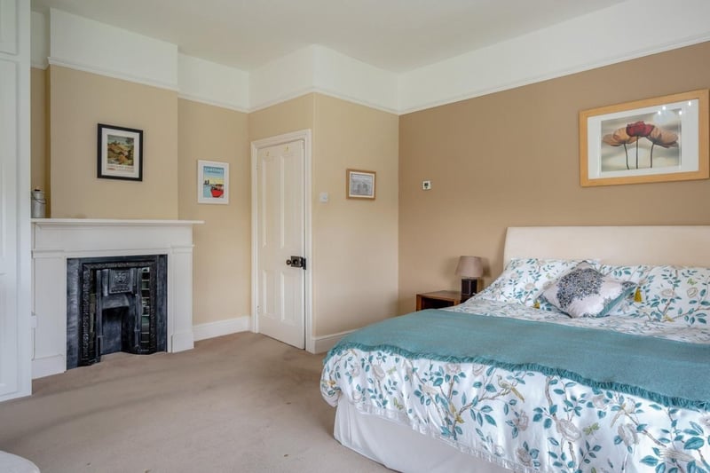 And here's one of the smaller bedrooms, with an original fireplace