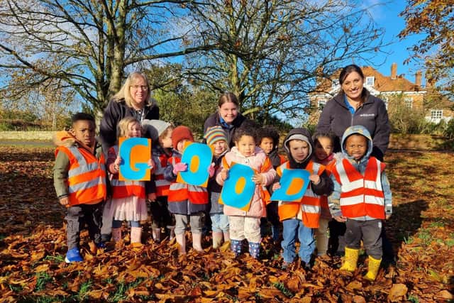 The Head Start Day Nursery & Preschool team and children celebrating their ‘Good’ Ofsted rating
