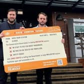 Milton Keynes City Council Leader Councillor Pete Marland and Labour candidate Chris Curtis at Wolverton station