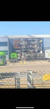 One wall of the warehouse was damaged