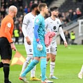 MK Dons are likely to stick with a similar defensive structure against Sheffield Wednesday, despite being thrashed 5-0 by Bolton Wanderers in the week