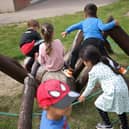 File picture of children playing outside in a playground (Photo by Sean Gallup/Getty Images)