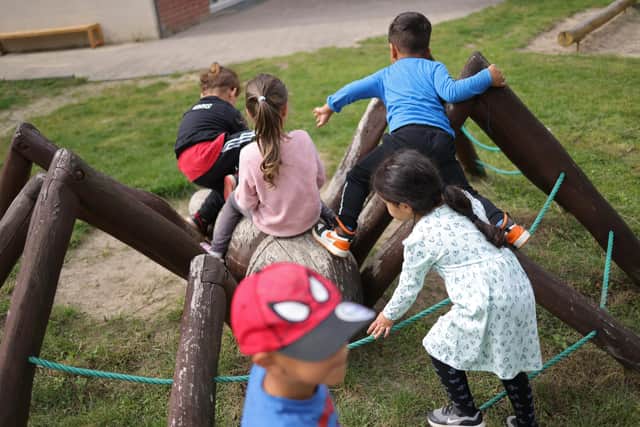 File picture of children playing outside in a playground (Photo by Sean Gallup/Getty Images)